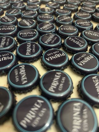 100 Chapas Corona Agua Pirinea