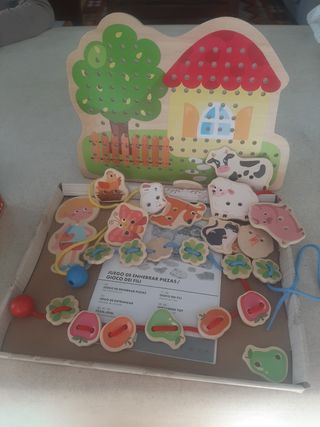 Juego de enhebrar piezas de madera