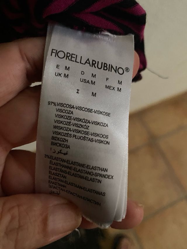 Jersey fino asimétrico a rayas rosa y negro