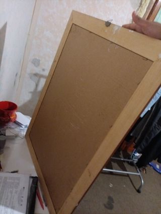 Specchio con cornice in legno