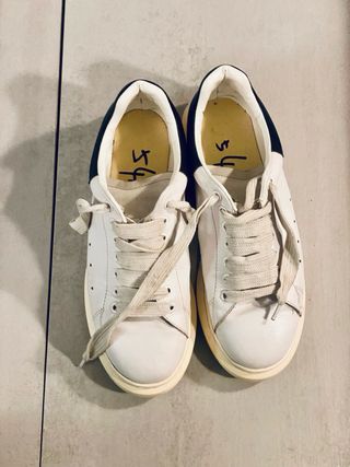 Sneakers bianche e nere Alexander McQueen