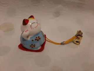 Gatti portafortuna cinesi giapponesi