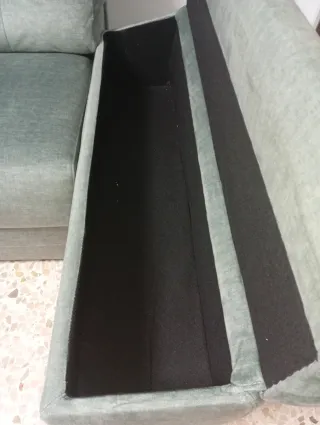 Sofá modular verde con almacenaje