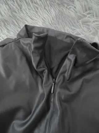 Top ecopelle nero maniche pipistrello