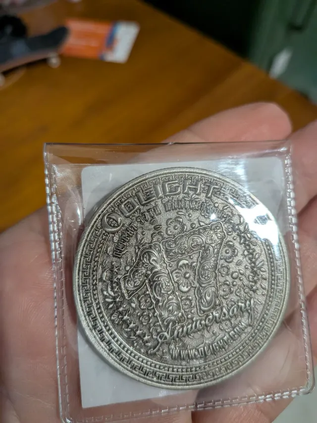 Moneda Olight 17 Aniversario