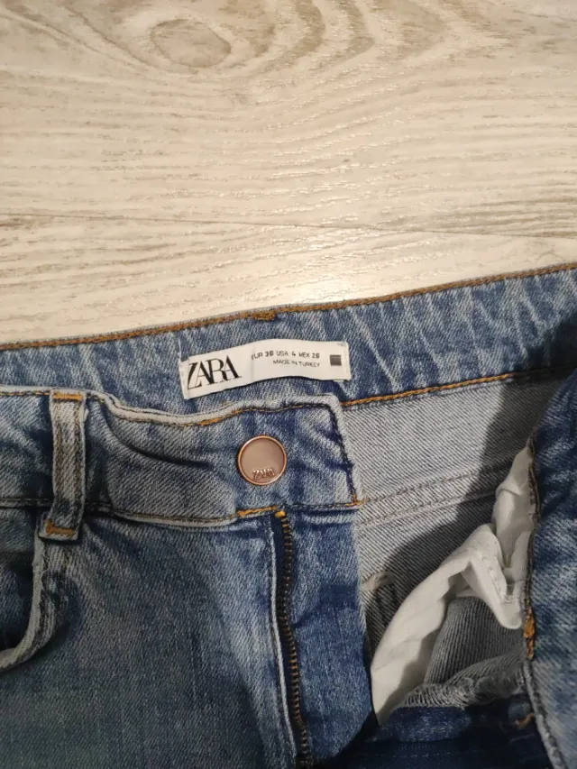 Tejanos chica flare bajos deshilachados