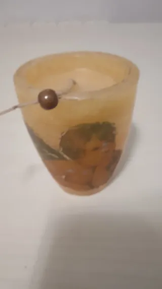 Candela decorativa con angelo