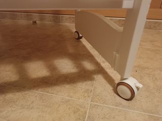 Minicuna con colecho y balancín en perfecto estado