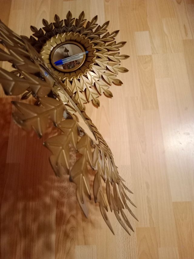 Espejos sol circular hojas doradas vintage retro
