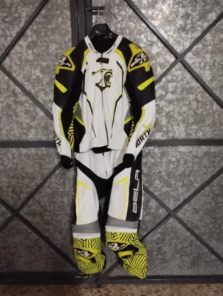 Mono de moto Bela blanco y amarillo