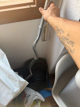 Gimnasio completo: barras, mancuernas y discos