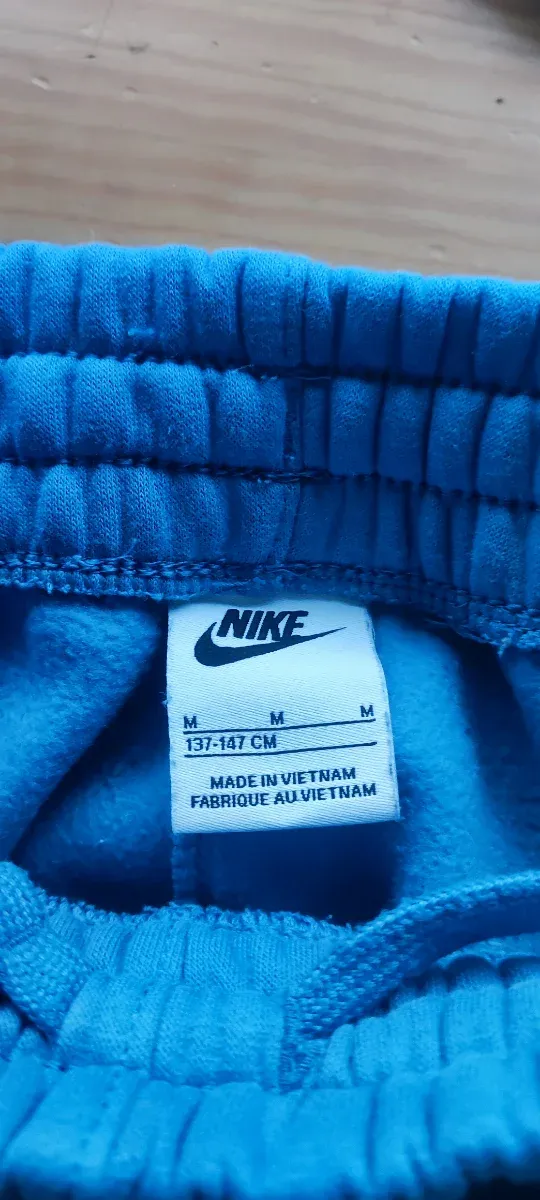Pantalón chándal Nike azul, talla M de niño