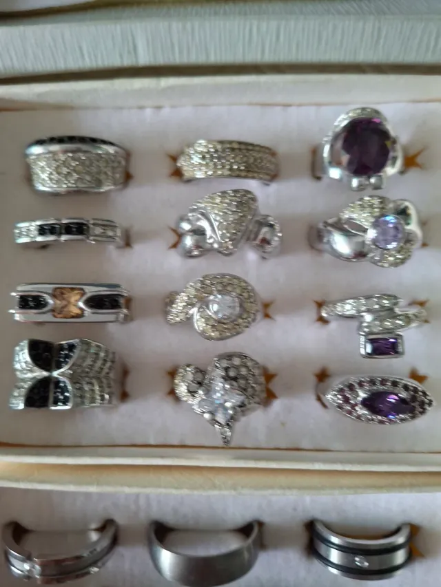 Lote anillos acero/rodio 1 caja de 12 × 9€