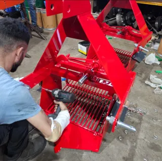 Arrancador de patatas rojo