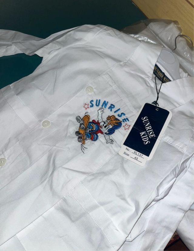 Grembiule bimbo Sunrise Kids con disegno