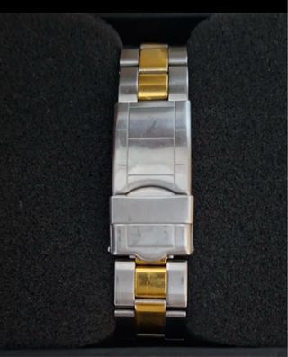 Reloj Amstrad Oro y Plata