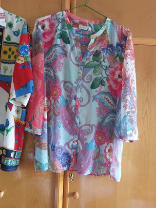 2 Blusas manga corta estampadas