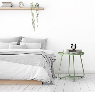 Tavolino da esterno rotondo in acciaio verde