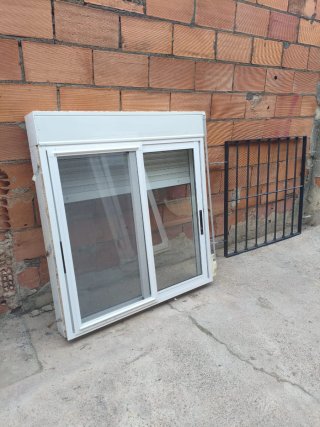 Ventana aluminio correderas + rejas