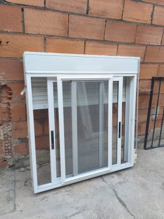 Ventana aluminio correderas + rejas