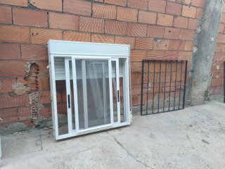 Ventana aluminio correderas + rejas