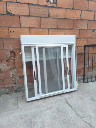 Ventana aluminio correderas + rejas
