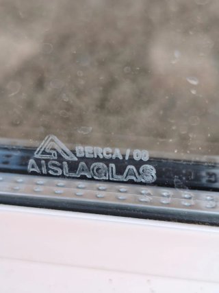 Ventana aluminio correderas + rejas