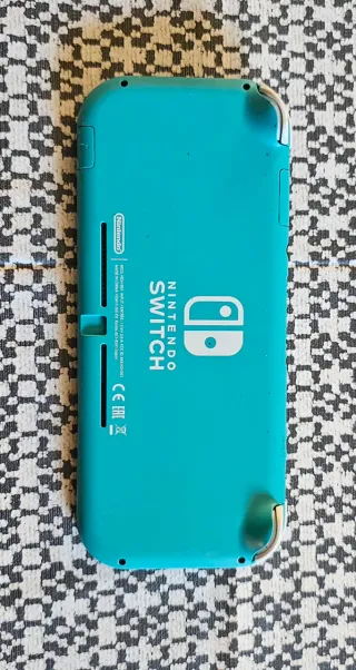Nintendo Switch Lite Verde + Custodia e Giochi