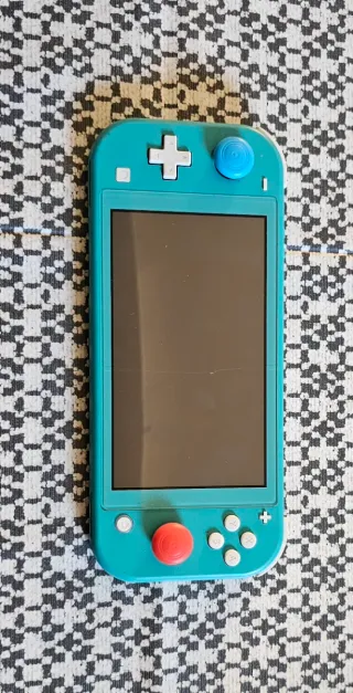 Nintendo Switch Lite Verde + Custodia e Giochi