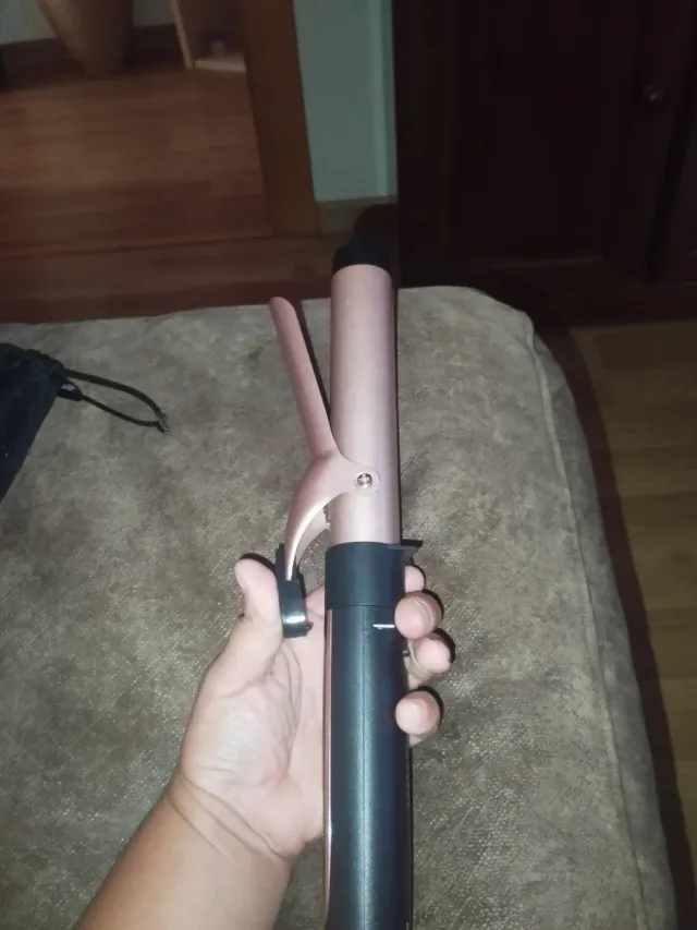 Rizador de pelo negro y rosa