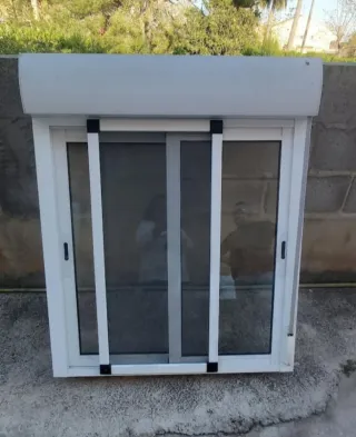 Ventana PVC corredera con persiana