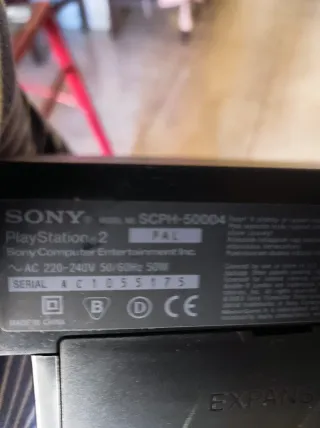 PlayStation 2 Negra con Mando y Juego