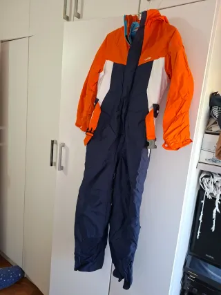 Mono de nieve infantil naranja y azul