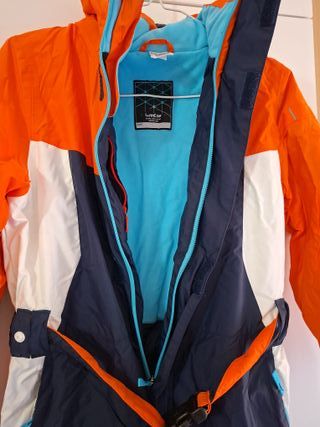 Mono de nieve infantil naranja y azul