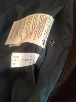 Chaqueta acolchada azul petróleo