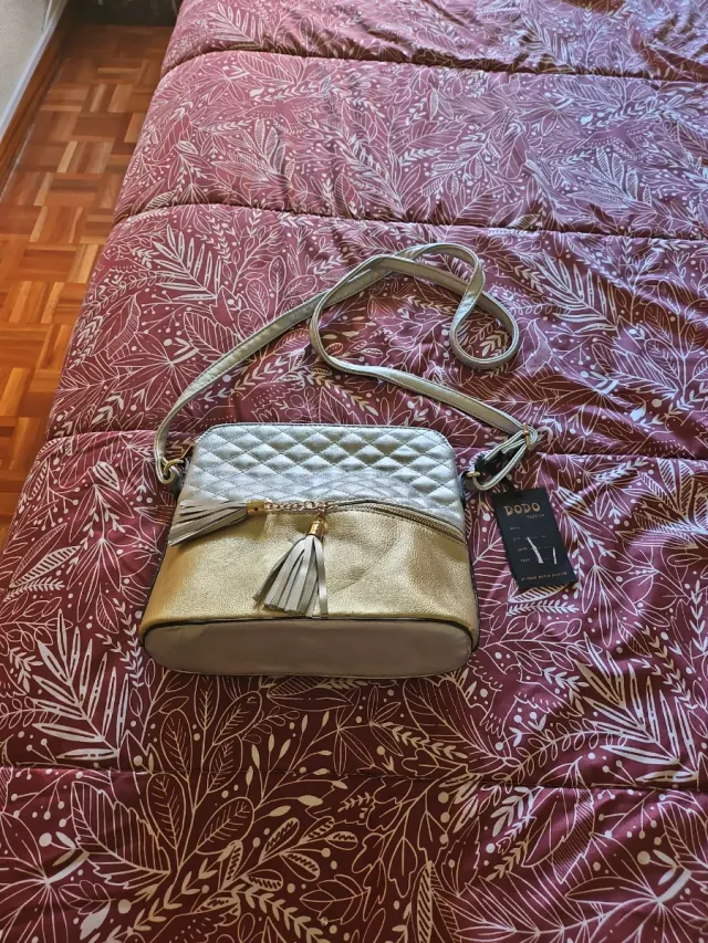 Bolso Dodo dorado y plateado