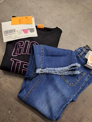 Felpa nera e jeans bambina