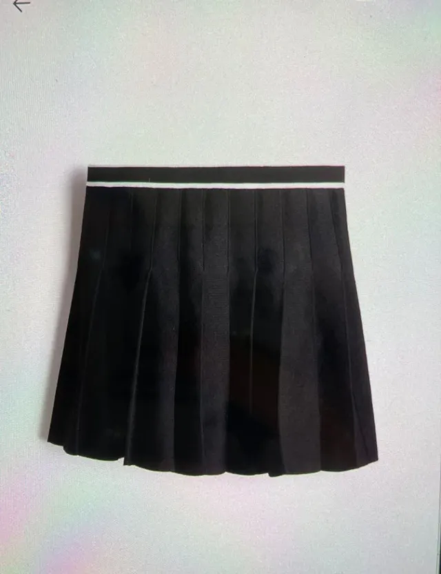 Falda mini plisada H&M negra