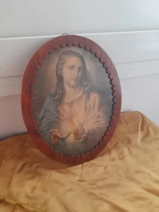 Antica cornice ovale in legno