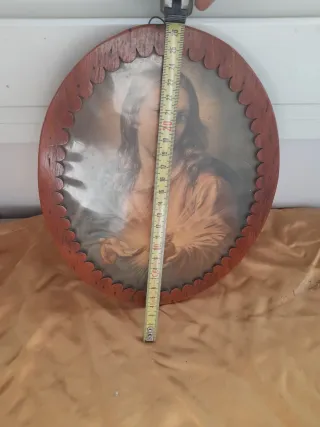 Antica cornice ovale in legno