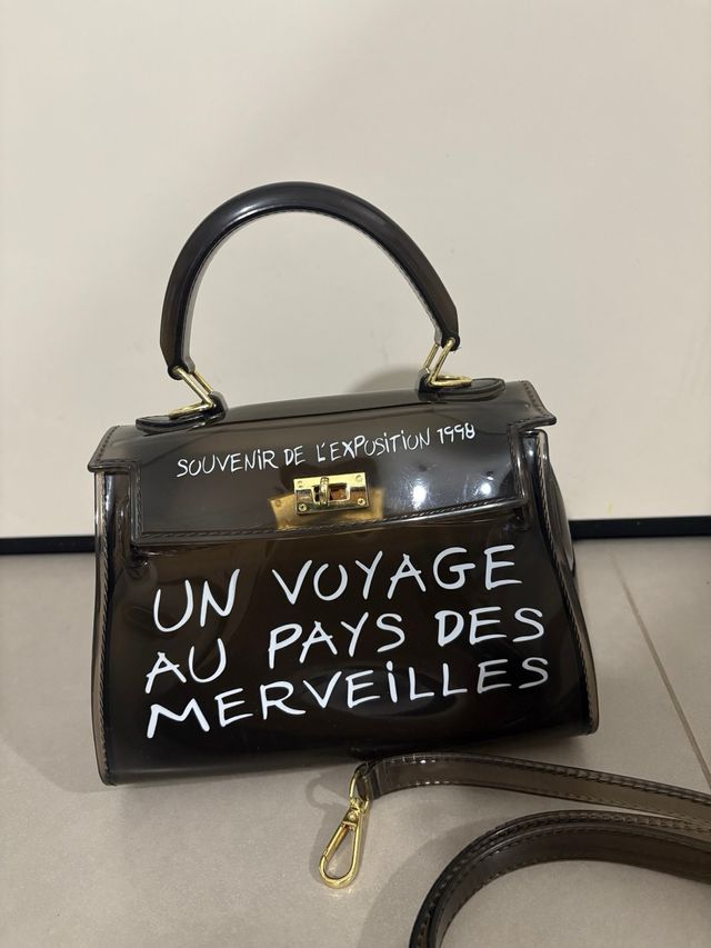 Borsetta trasparente con manico e tracolla