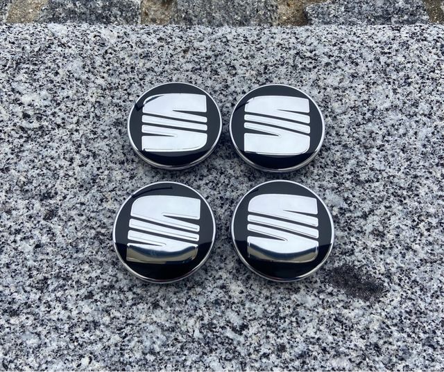 Tapabujes Seat 56mm Negro Plata Nuevos