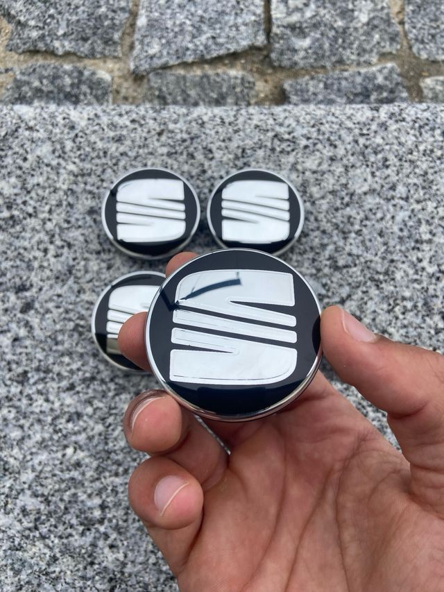 Tapabujes Seat 56mm Negro Plata Nuevos