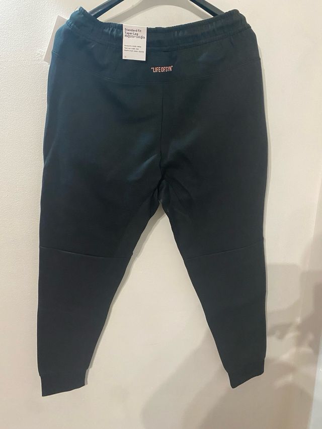 Tuta SNTN nera rosa stile Central Cee