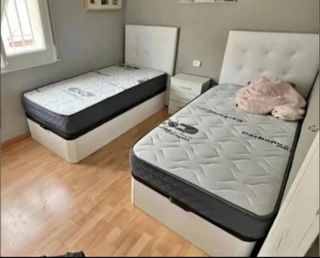 2 Camas individuales con cabecero negro