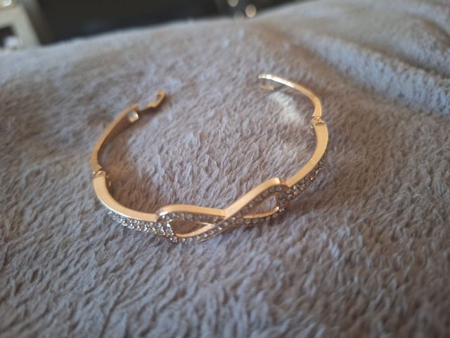 Pulsera caña infinito dorada acero