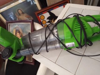 Aspirador de mano verde