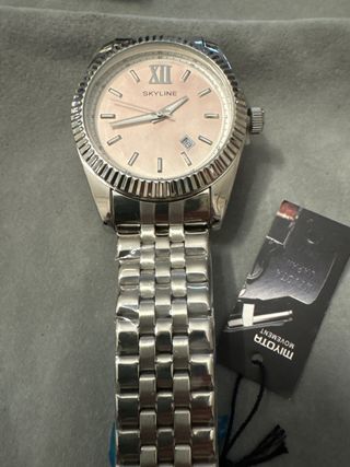 Reloj SKYLINE esfera rosa y correa plateada