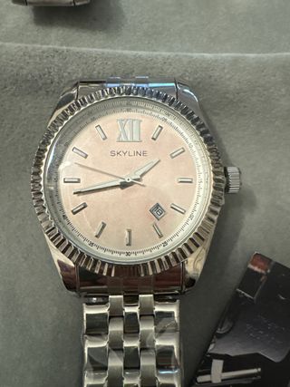 Reloj SKYLINE esfera rosa y correa plateada