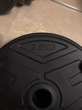 Juego de pesas ajustables.